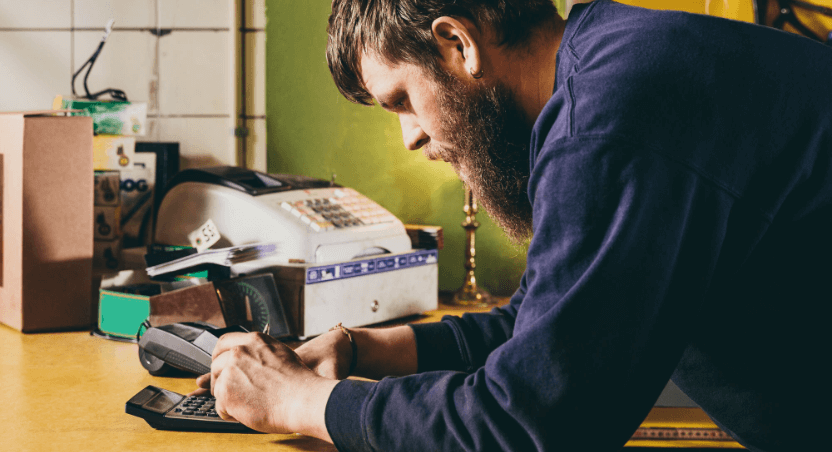 Man using calculator